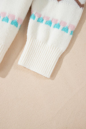 White acrylic knit sweater with pastel geometric pattern and ribbed cuffs.