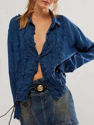 Dark Blue linen button-down blouse with ruffled front and button closure.