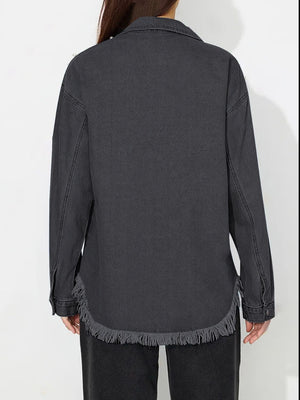 Dark wash denim shirt with frayed hem and pearl embellishments.