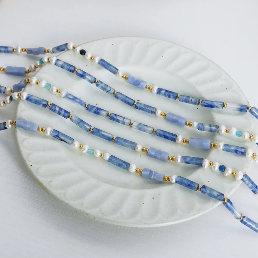 Lapis Lazuli & Pearl Bead Necklace with gold accents, light blue.