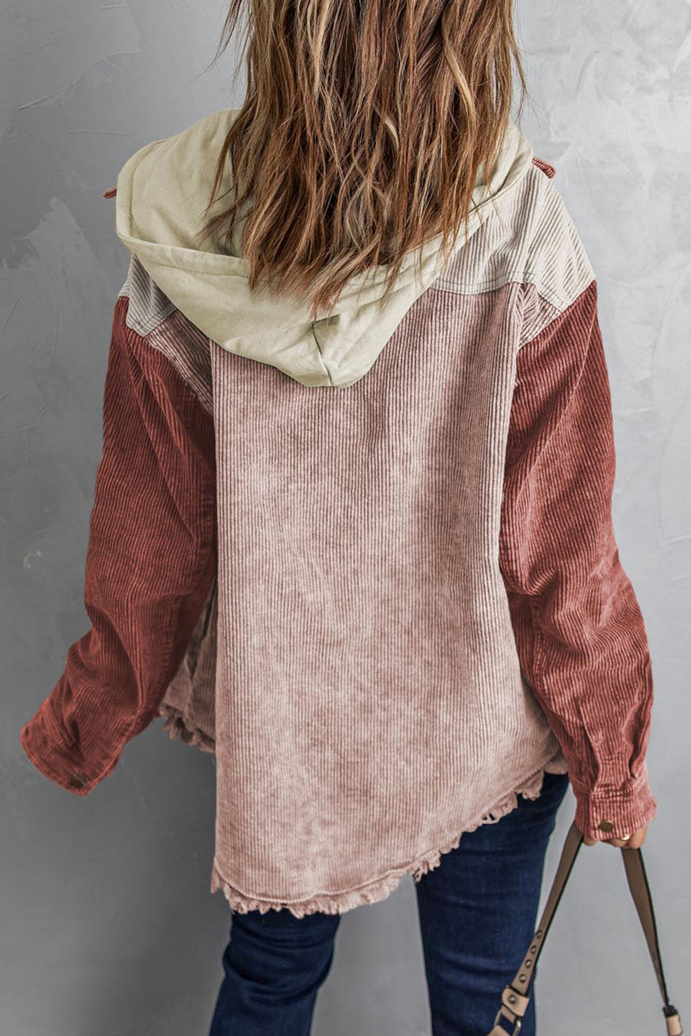 Colorblock corduroy hooded utility jacket with tan sleeves and blush pink body.