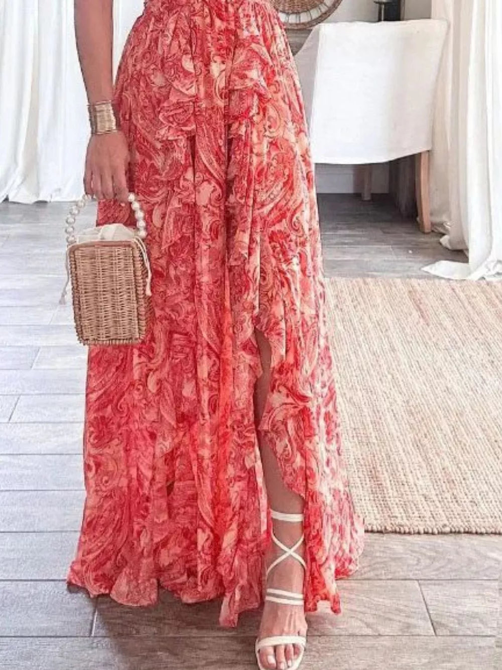 Deep Red ruffled V-neck maxi dress with a paisley print and high slit.