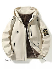 Beige plush lined hooded utility jacket with drawstring, zip pockets, and patch detail.