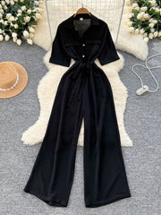Black belted wide-leg maternity jumpsuit with pockets and button front