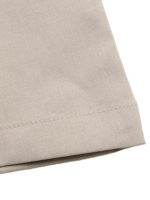 Elegant wide-leg romper in beige fabric with visible stitching detail.