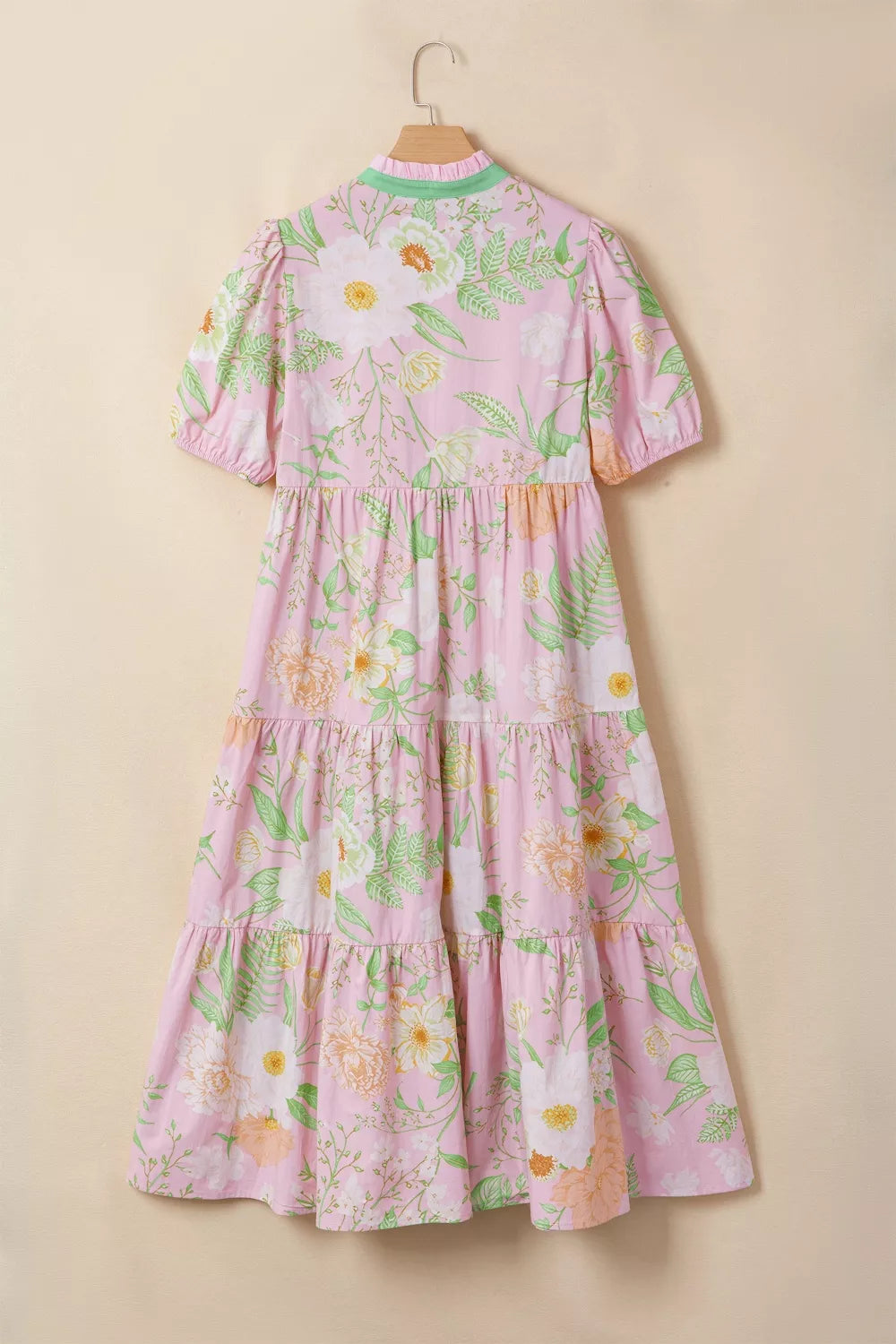 Pink floral tiered midi dress with puff sleeves and green trim