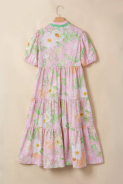 Pink floral tiered midi dress with puff sleeves and green trim
