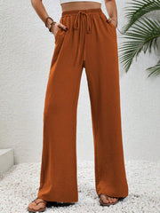 Textured palazzo trousers in caramel with drawstring waist and wide legs