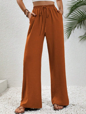 Textured palazzo trousers in caramel with drawstring waist and wide legs