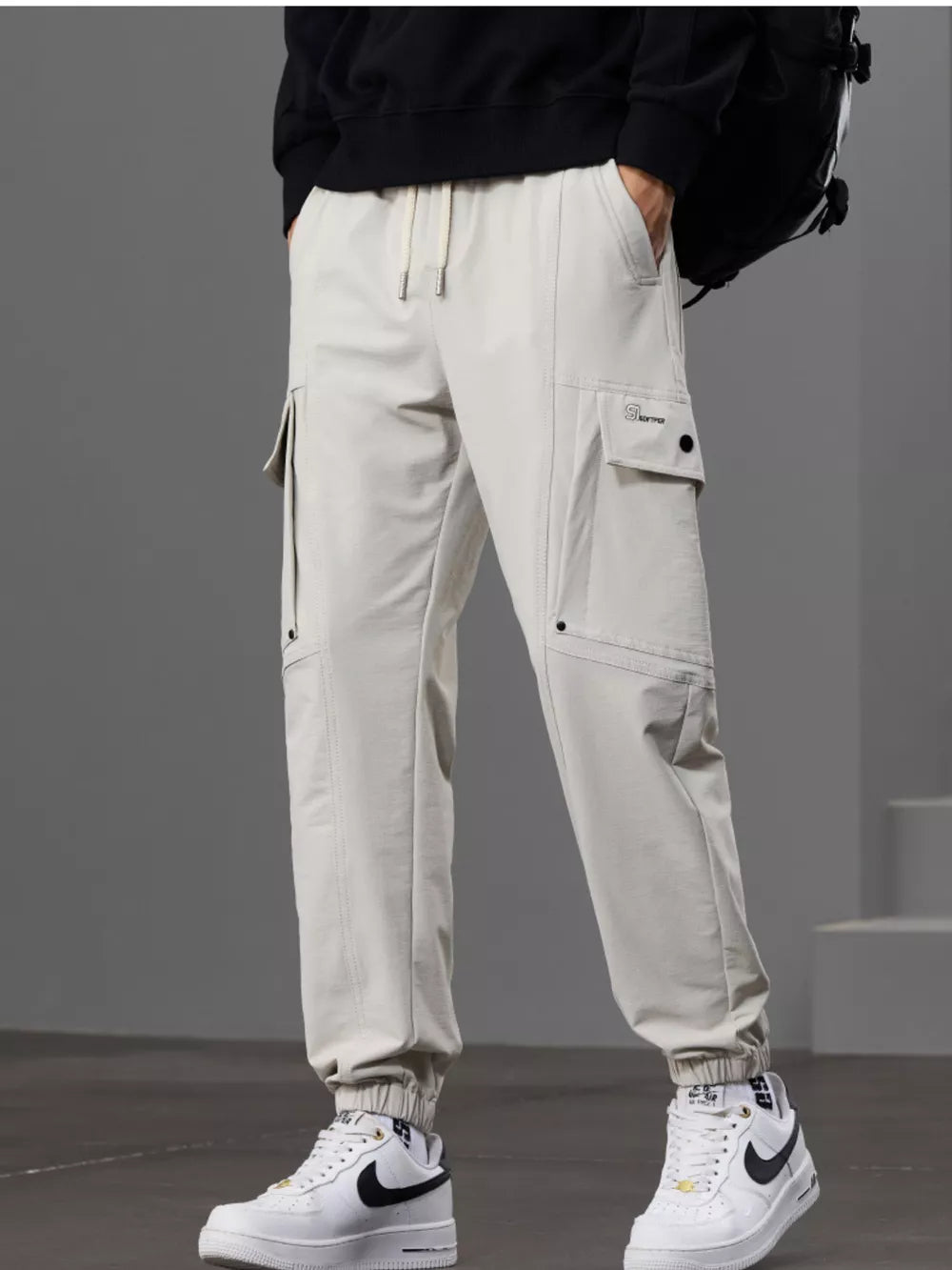 Men S Casual Cargo Pants With Drawstring Waist in Khaki, fit detail