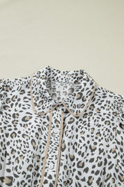 Print Button-down Midi Dress with leopard print, Peter Pan collar, and button detail.