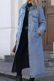 Longline blue denim jacket with pockets, button front, and collared neckline.