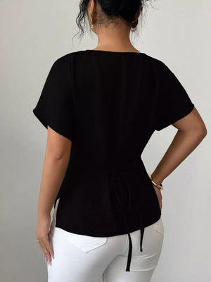 Black short sleeve maternity blouse with tie back detail