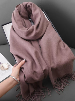 Dusty Pink scarf with fringe detail, soft texture, and versatile styling.