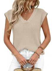 Textured apricot knit V-neck sweater vest with cap sleeves.