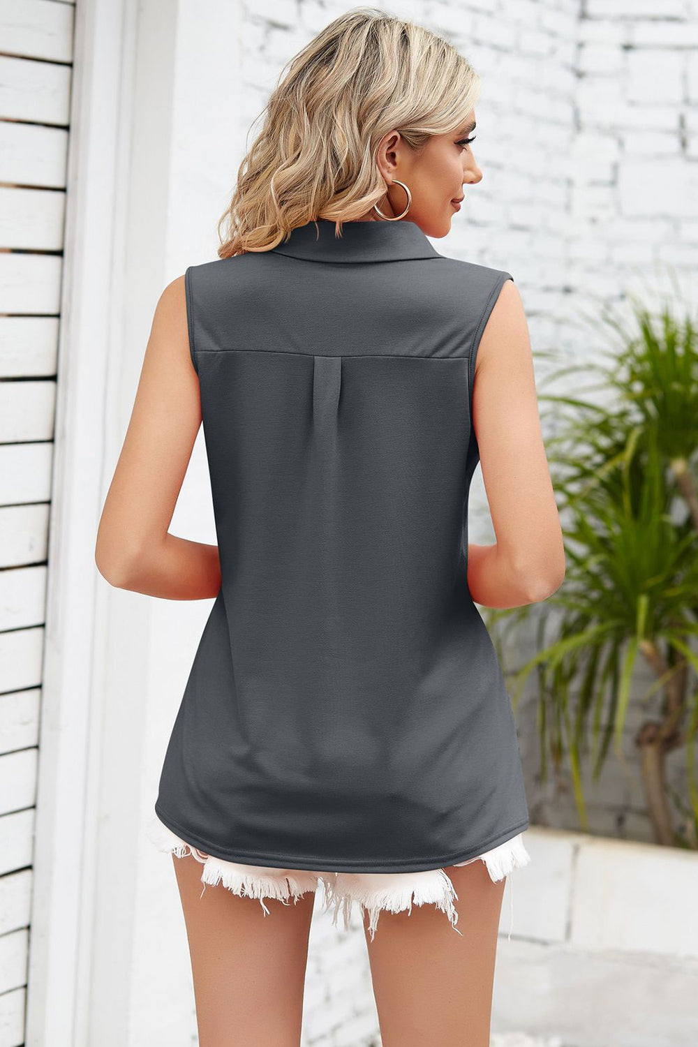 Sleeveless dark gray collared top with pleat detail on back, casual style