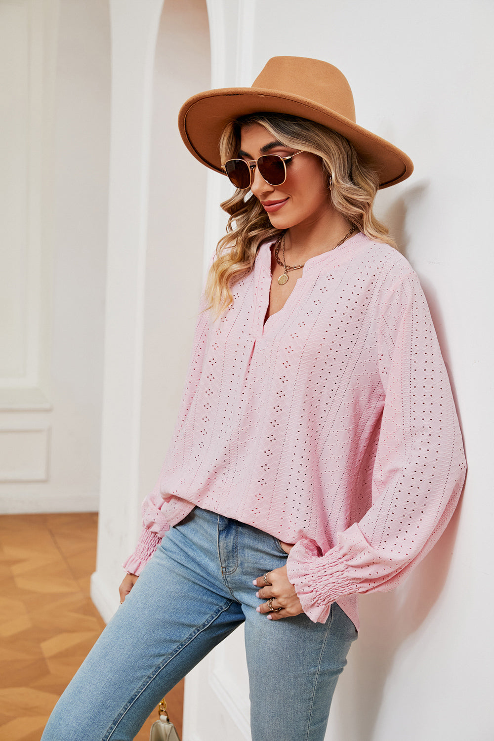Blush pink eyelet detail blouse with poet sleeves and V-neck