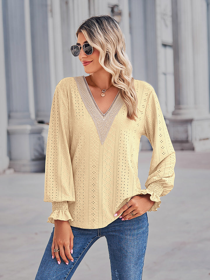 Canary yellow blouse with eyelet lace inset and blouson sleeves.
