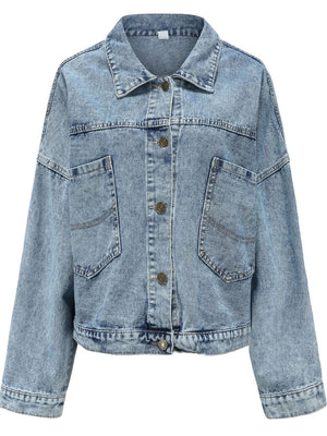 Light wash oversized denim jacket with buttoned patch pockets and collar