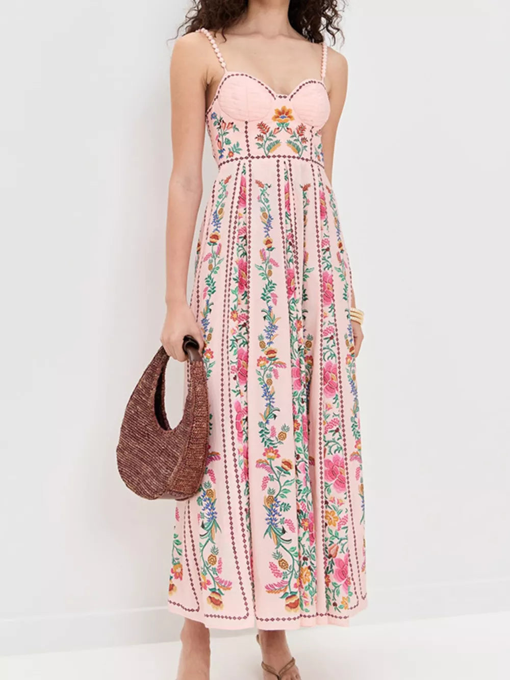 Pink floral sweetheart neckline midi dress with beaded straps and a gathered bodice.