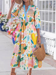Midi dress with 3/4 sleeves, V-neck, and whimsical floral doodle print on cotton fabric.