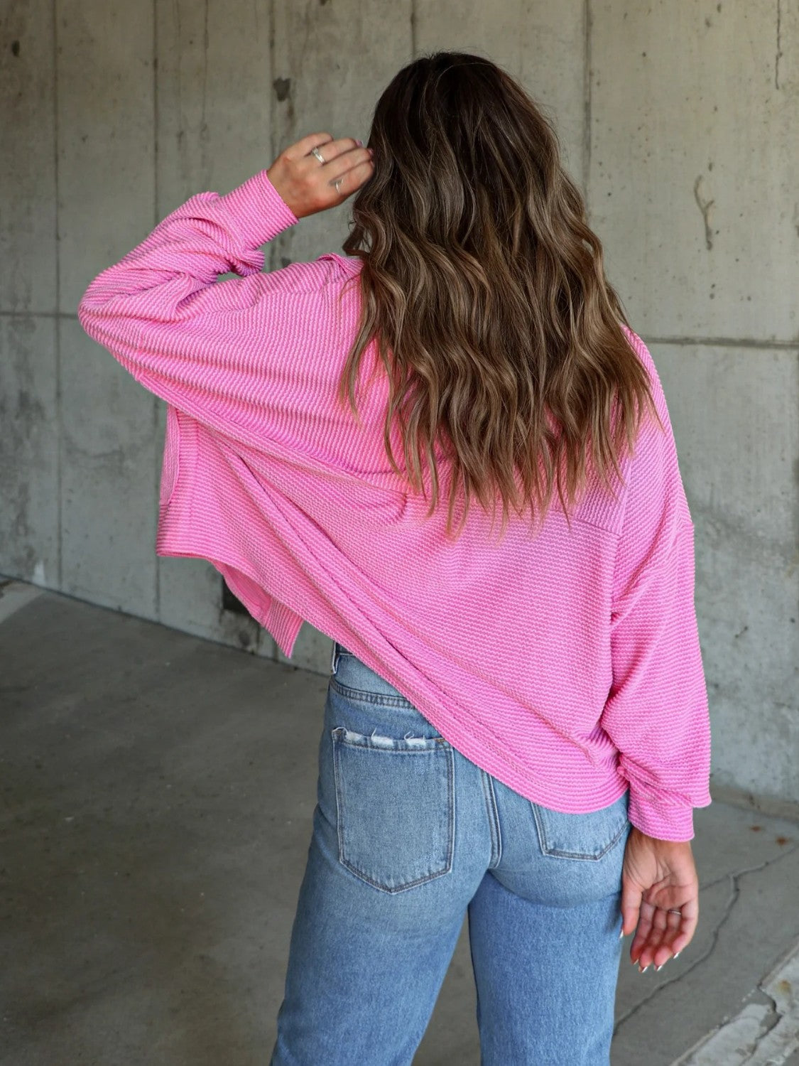 Textured boxy utility shirt jacket in Fuchsia Pink with a subtle stripe pattern.