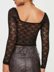 Black lace bustier top with sweetheart neckline and long sleeves.
