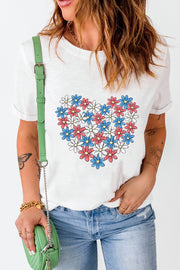 White t-shirt with a red, white, and blue floral heart graphic.