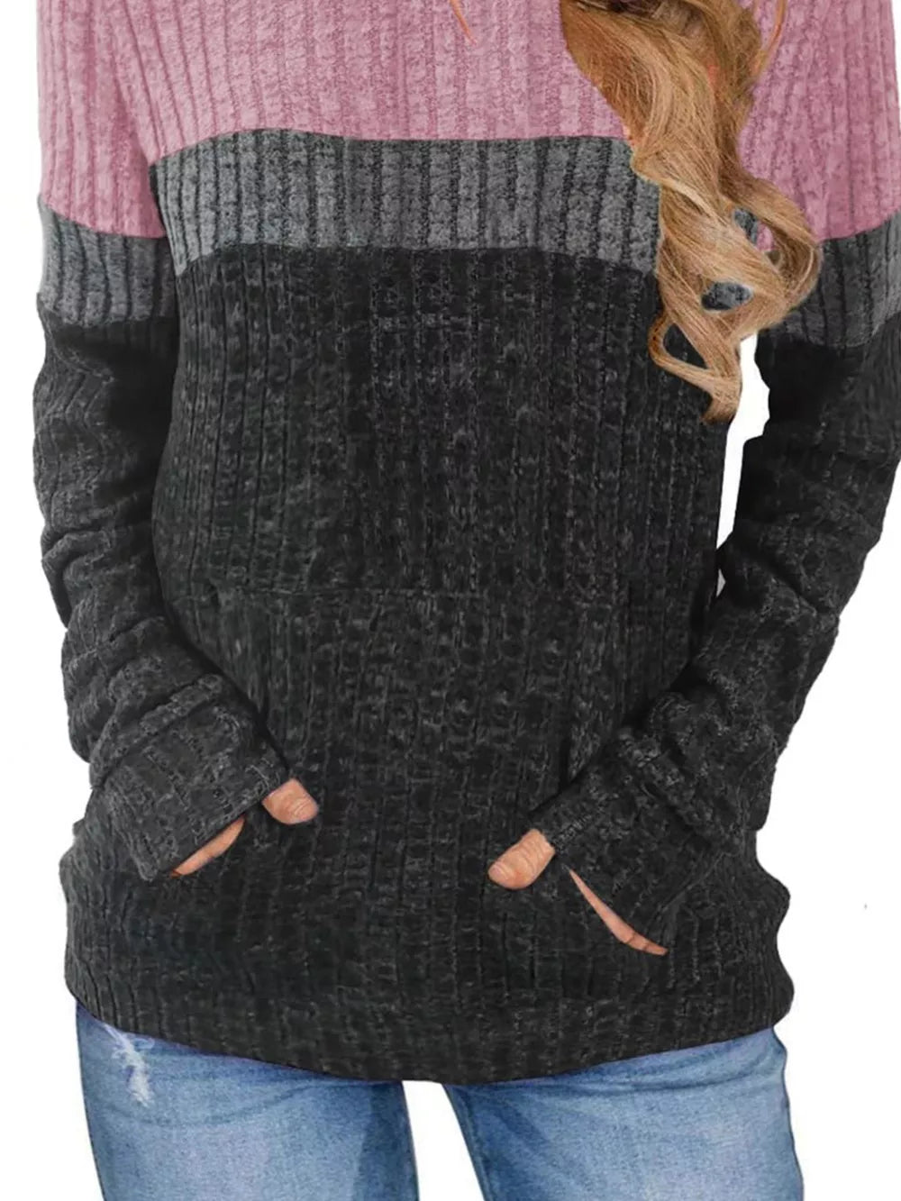 Chic color block ribbed knit sweatshirt in pink, gray, and black with thumbholes and pockets.