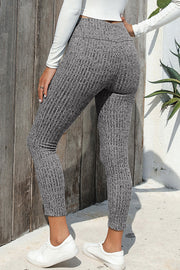 Gray textured knit leggings with a ribbed pattern and high waist.