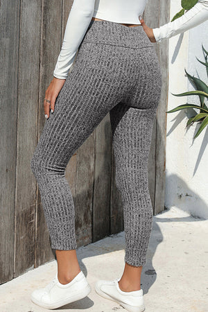 Gray textured knit leggings with a ribbed pattern and high waist.