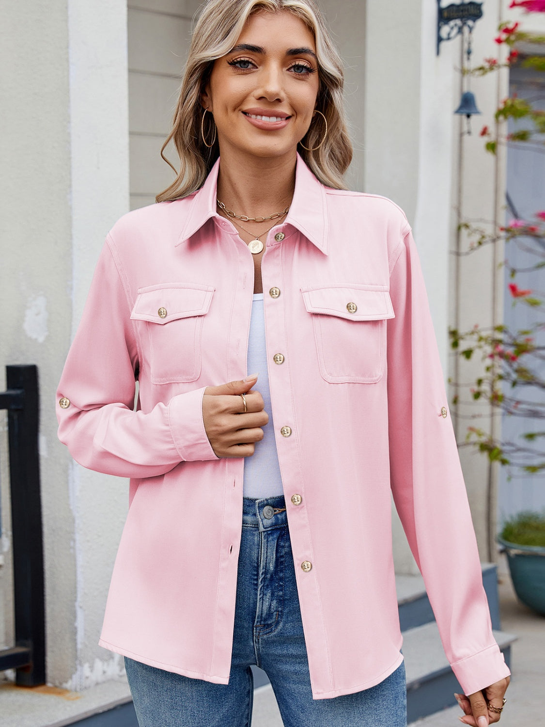 Blush pink utility crepe shirt with button-flap chest pockets and roll-tab sleeves.