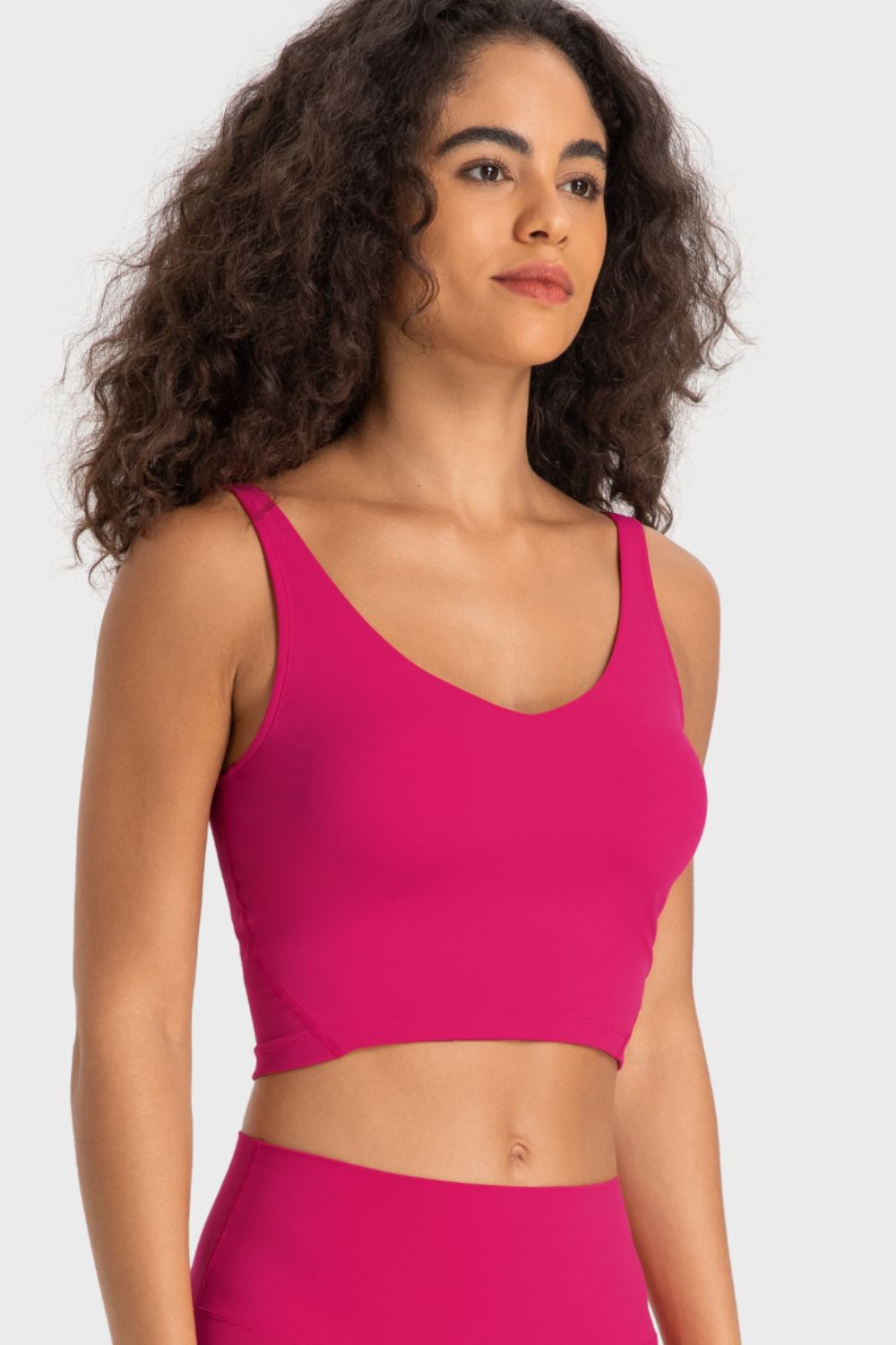 Sculpted Scoop Neck Crop Top in Hot Pink with a seamless design and wide straps.