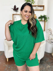 Textured boxy tee and shorts set in mid green with a ribbed knit fabric.