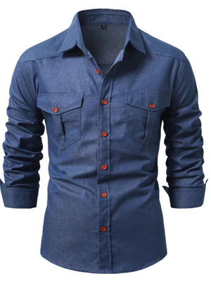 Denim blue cotton blend casual shirt with button-down front and two chest pockets.