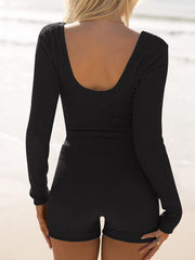 Black ribbed scoop neck long sleeve top and shorts set with a textured finish.