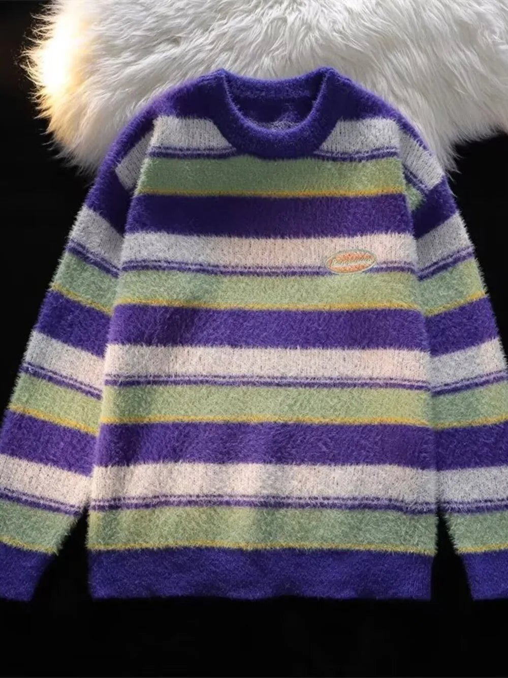 Men's fuzzy knit pullover sweater with colorful stripes and crew neck