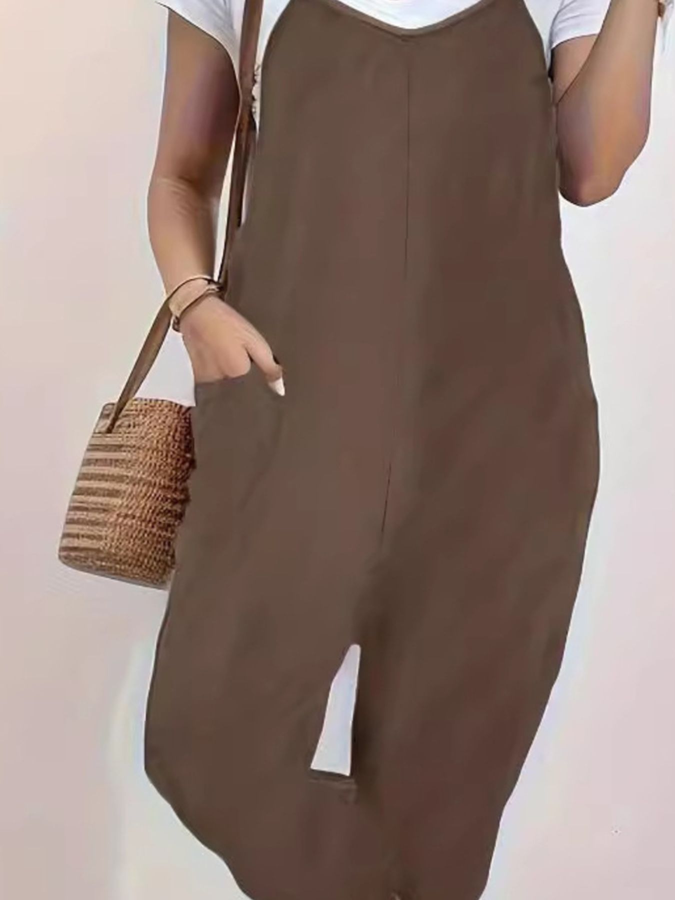 Heathered loose fit spaghetti strap jumpsuit in coffee brown with pockets.