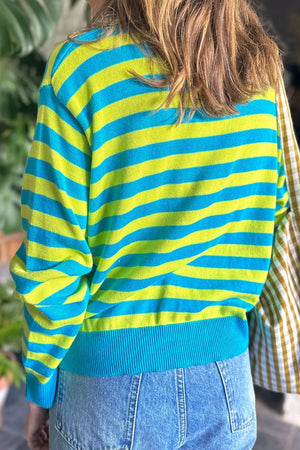Electric Stripe Crewneck Sweater in Sky Blue with horizontal stripes, crewneck, and ribbed hem.