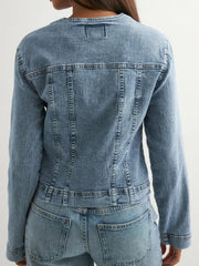 Denim jacket with seam detailing and button-down front.