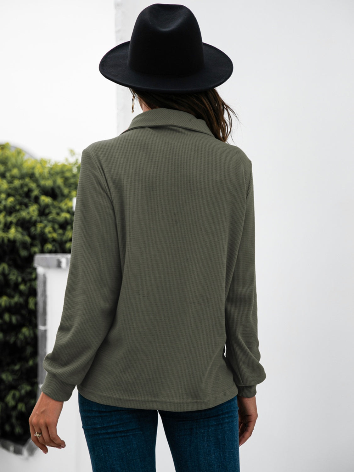 Army green waffle knit long sleeve tee with collar and button detail.