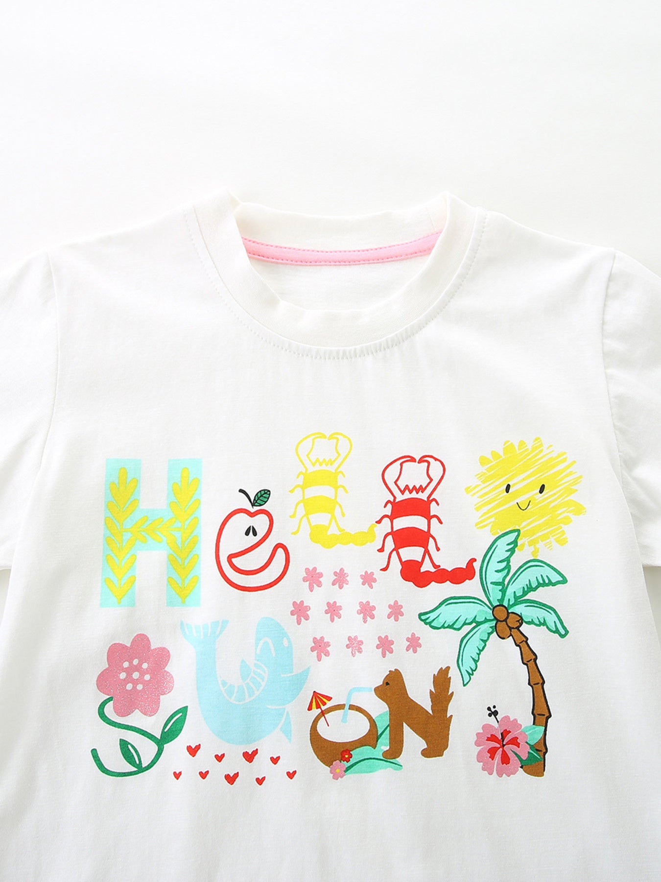 White cotton tee with colorful "Hello Sun" graphic and playful summer icons.