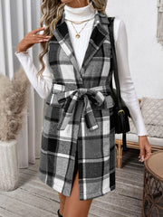 Plaid longline vest in dark gray with a belted waist and notched lapels.