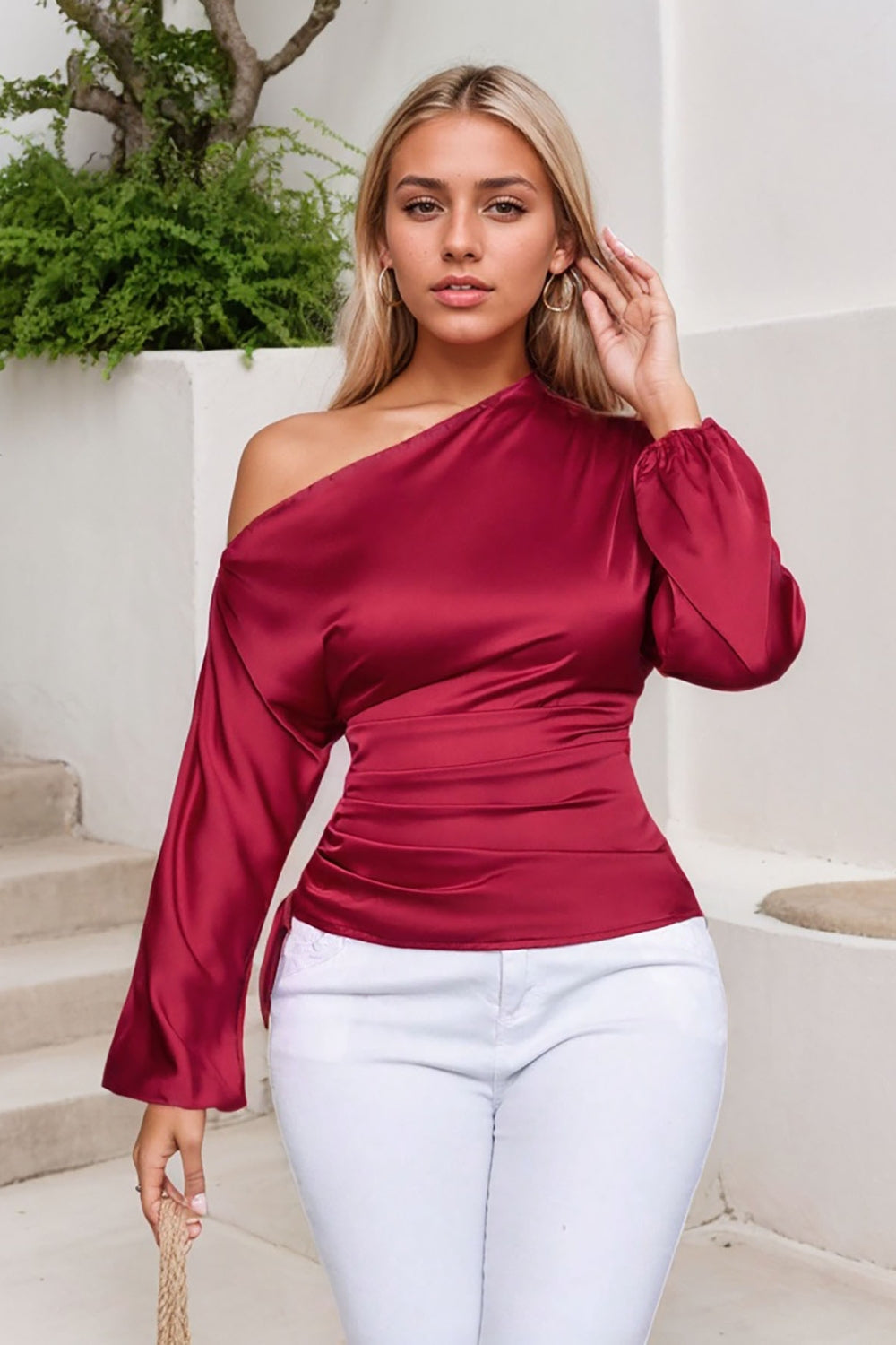 Deep Red satin blouse with asymmetric neckline, ruched sides and long bell sleeves.