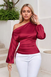 Deep Red satin blouse with asymmetric neckline, ruched sides and long bell sleeves.