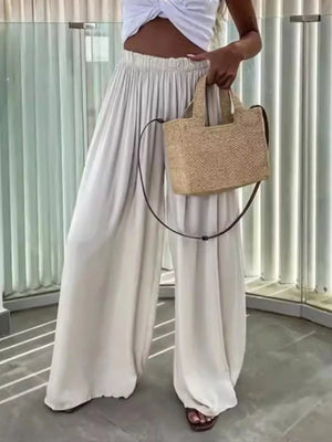 Maternity paperbag waist pants in apricot, wide leg, cotton, with adjustable fit.