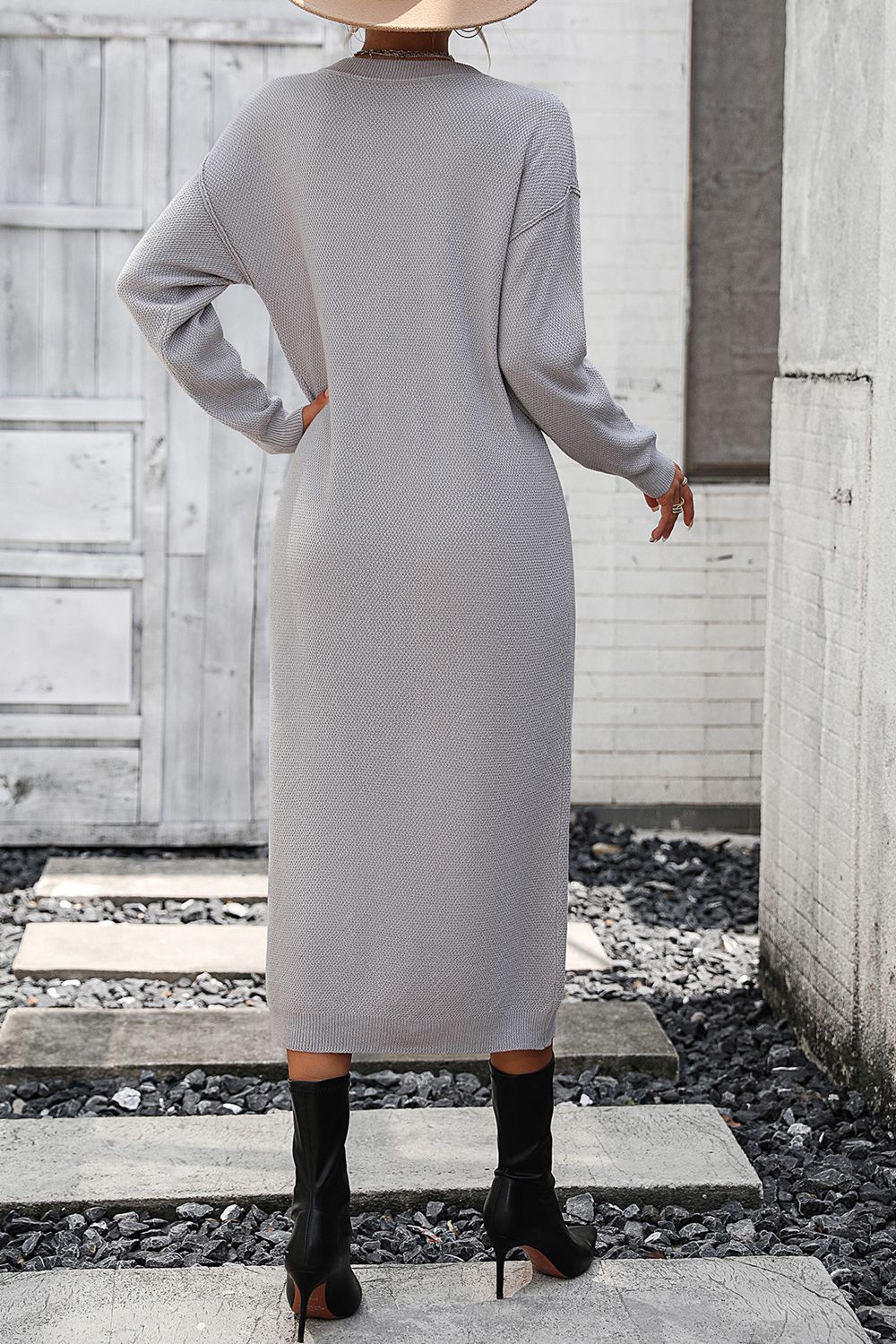Light gray textured knit henley midi dress with long sleeves and a crew neck.