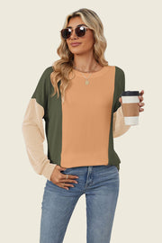 Colorblock waffle knit pullover with crew neck and long sleeves in green, tan, and cream.