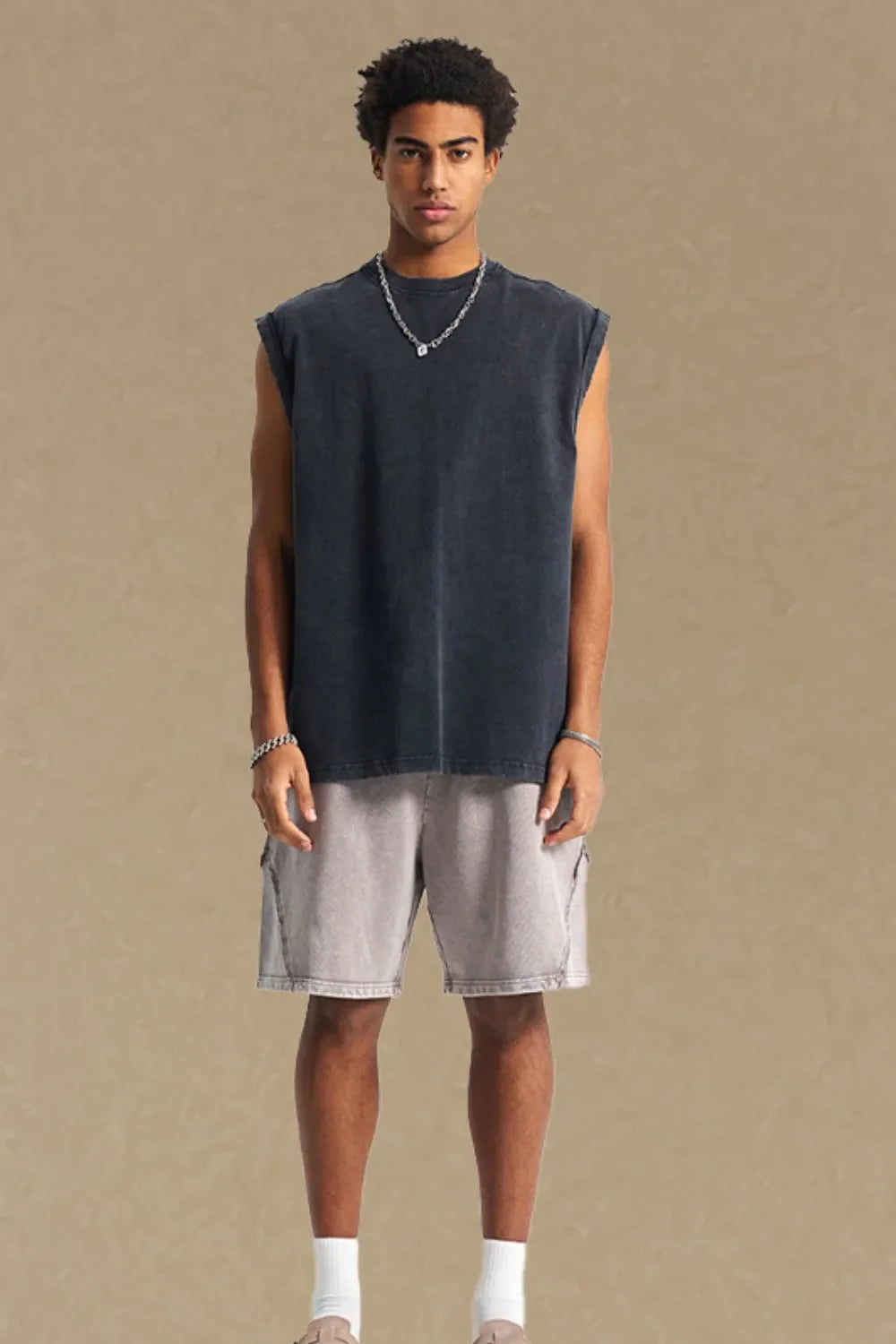 Black washed cotton muscle tee with relaxed fit and crew neck.