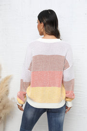 Horizontal stripe waffle knit pullover sweater with color block pattern in apricot and white.